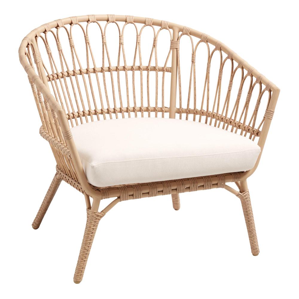 Rattan accent chair with cushion.