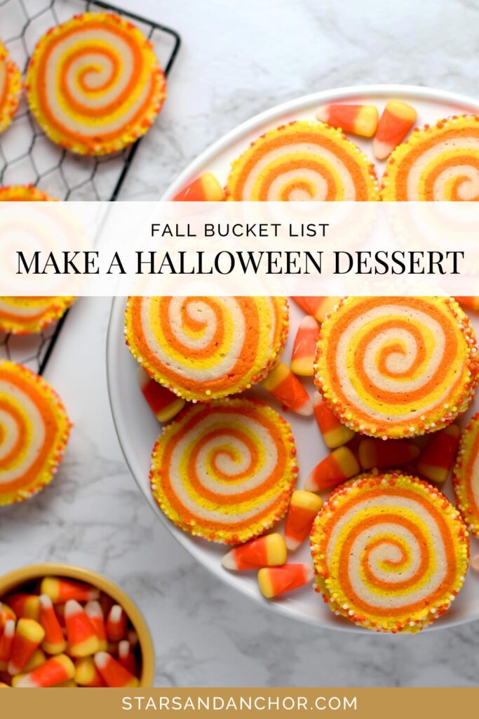Orange and yellow swirl cookies and candy corn, with text that says, "fall bucket list: make a Halloween dessert."