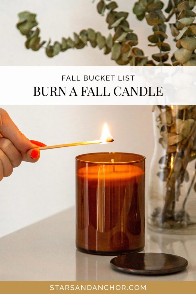 A hand lighting a candle, with text that says, "fall bucket list: burn a fall candle."