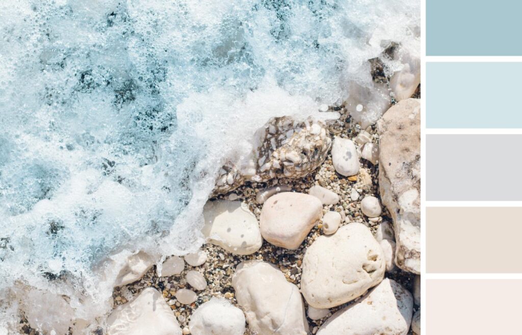 Wave crashing over rocks at the beach, and five beach color palette swatches..