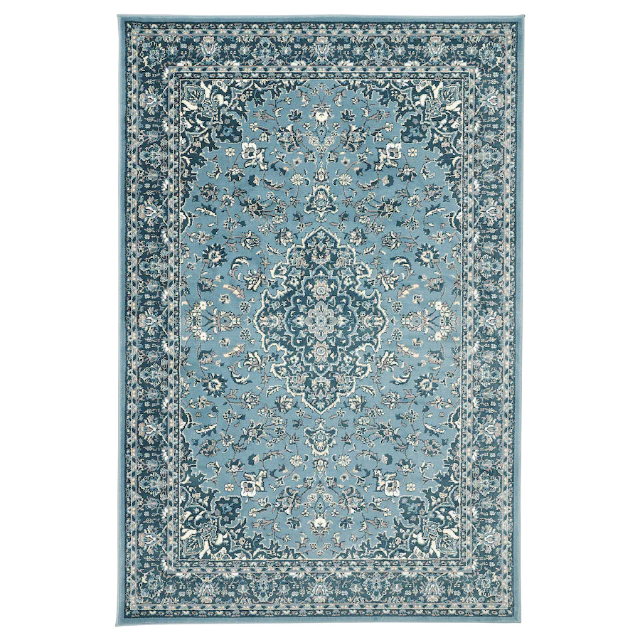 A blue vintage-style floral rug.
