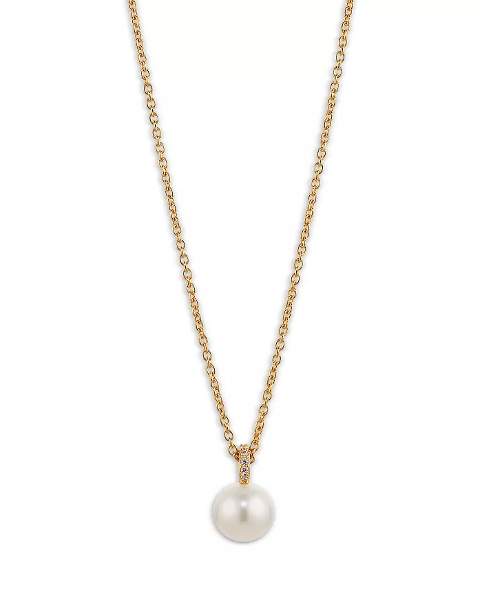 A gold necklace with a single freshwater pearl.