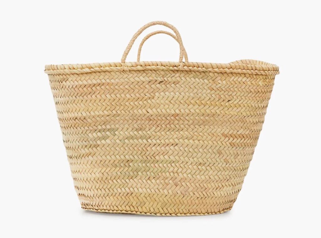 A woven straw tote bag.