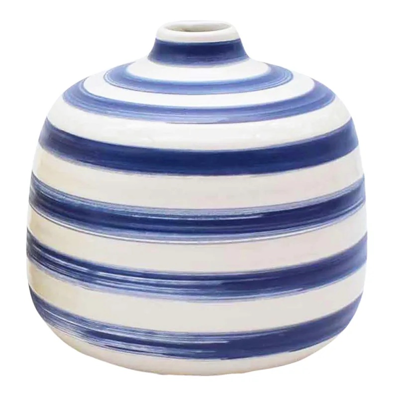A blue and white striped vase.