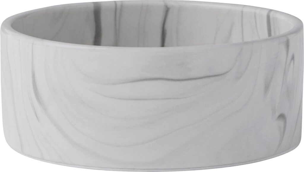 A ceramic dog bowl with a marble design.