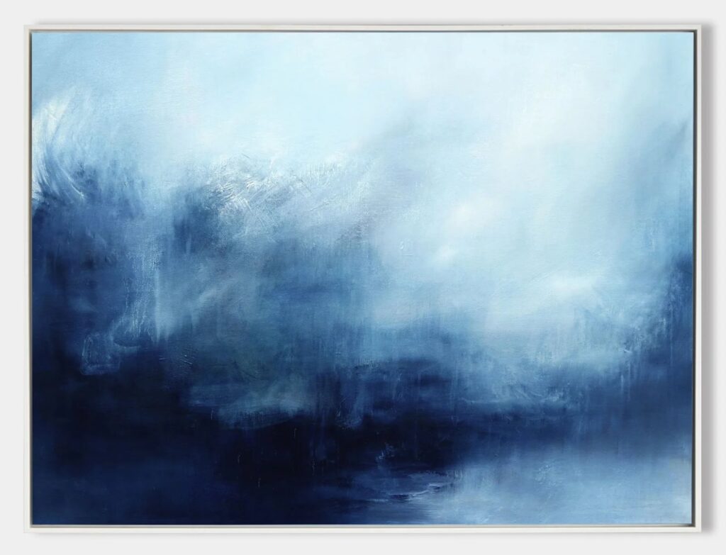 A framed abstract art painting with dark blue fading into light blue from one corner to the opposite corner.