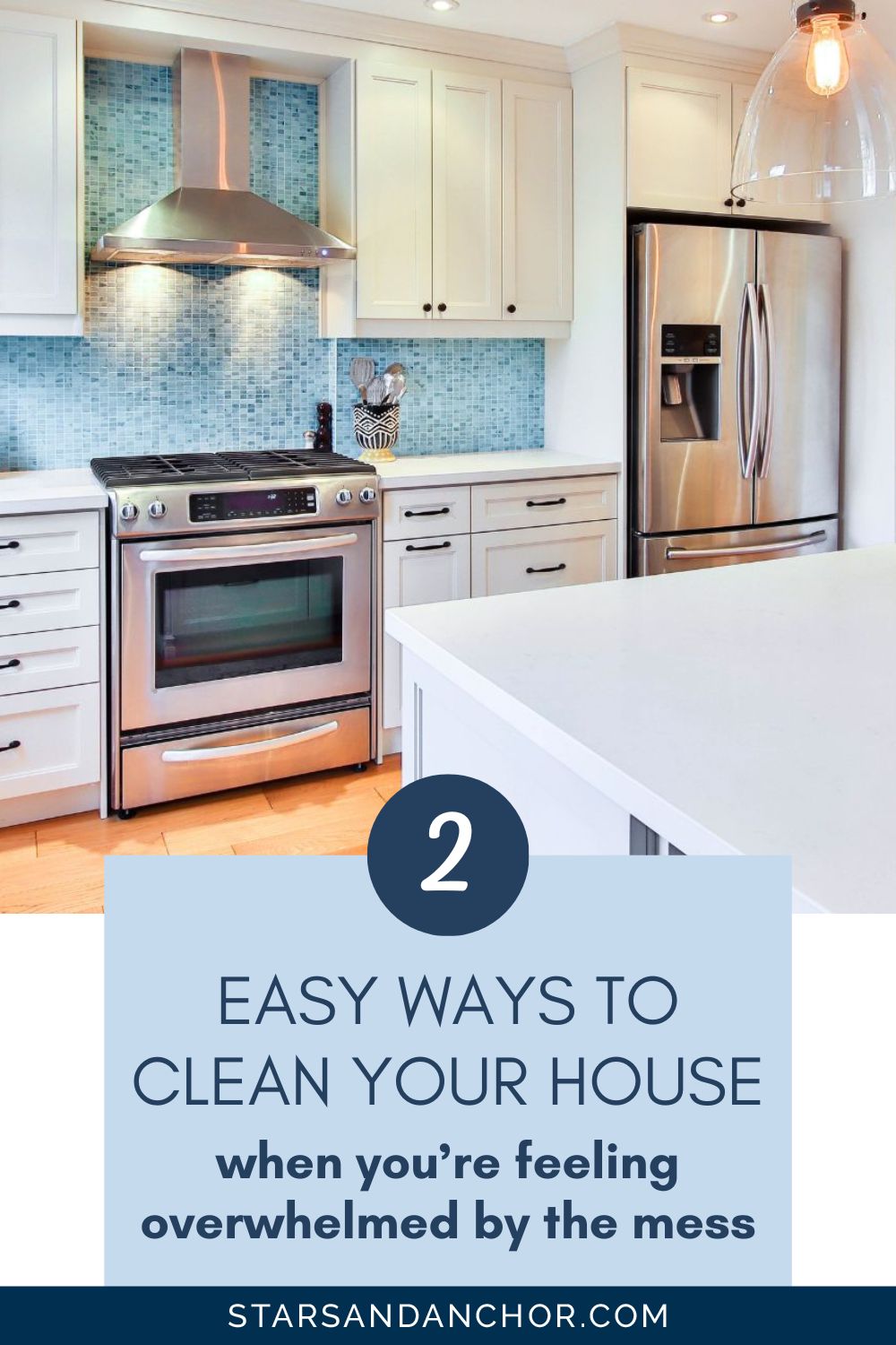 An image of a clean kitchen, with a text overlay that says, 2 easy ways to clean your house when you're feeling overwhelmed by the mess. From Stars and Anchor.