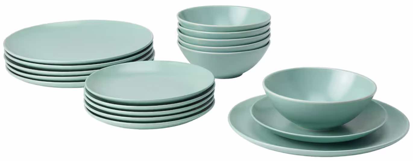 A light turquoise 18-piece dinnerware set consisting of bowls and two sizes of plates.