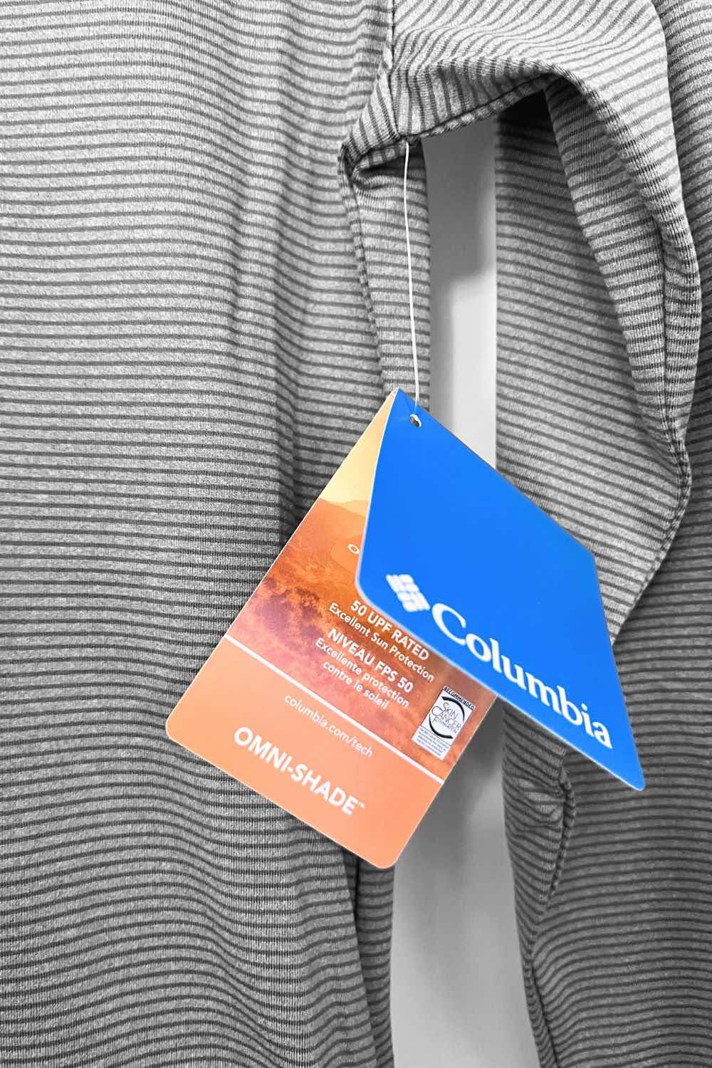 A hang tag for a Columbia shirt saying that it's 50 UPF rated for excellent sun protection.