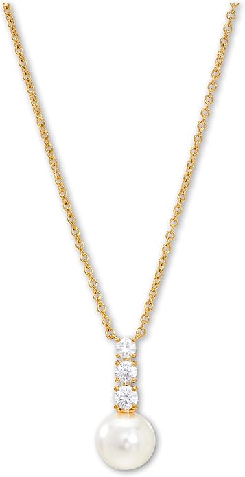 A pearl drop necklace on a gold chain.