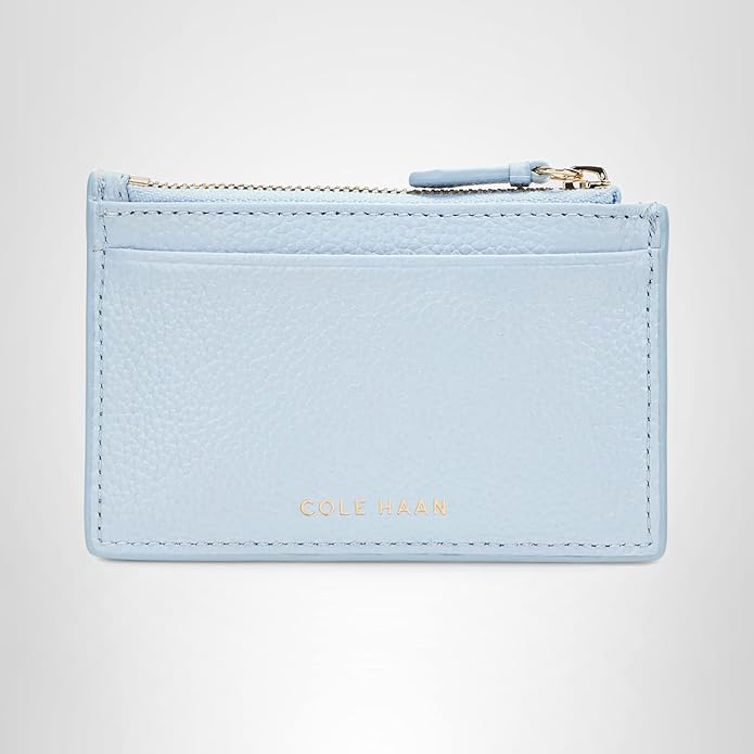 A light blue women's card case with a zipped section.