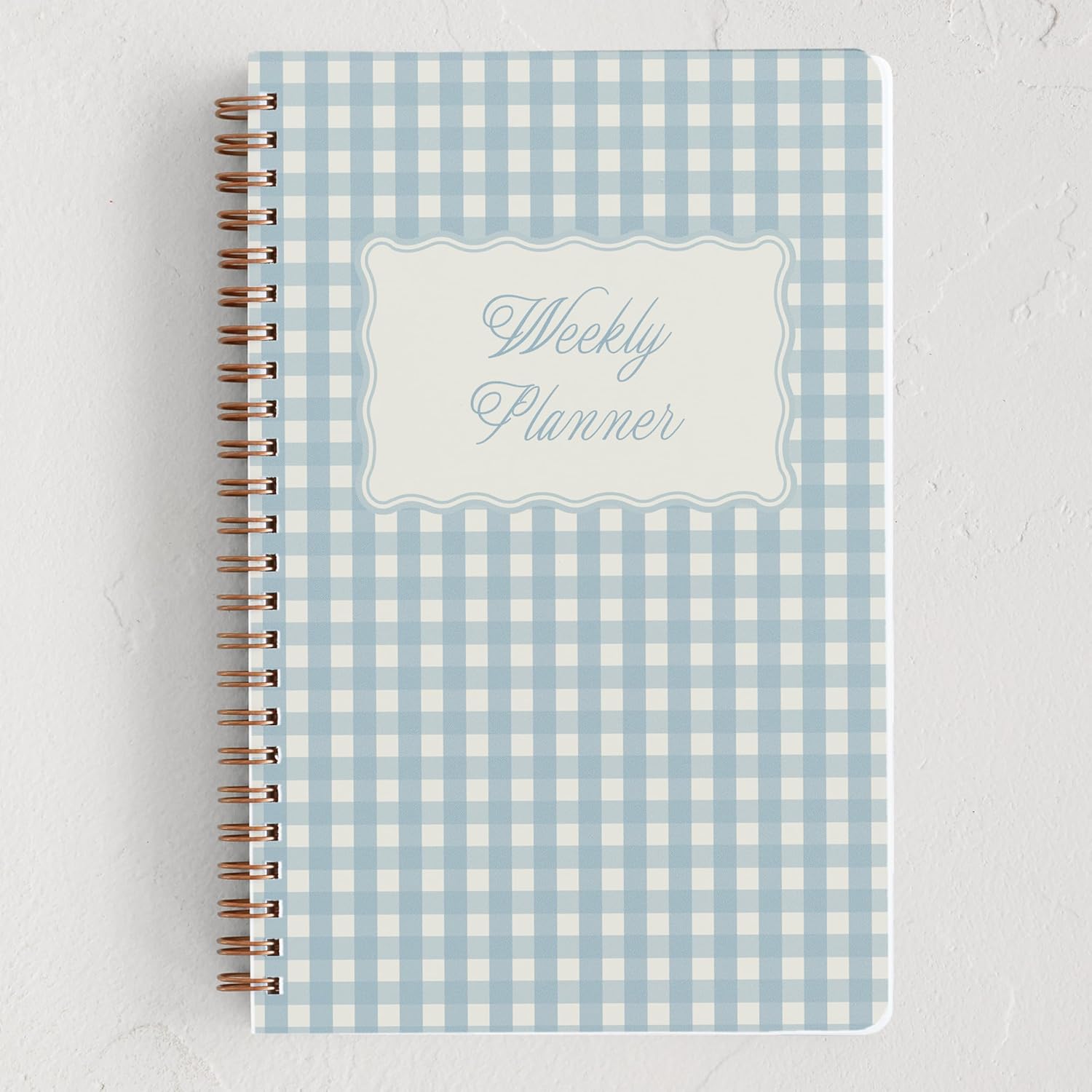 A light blue gingham Weekly Planner.