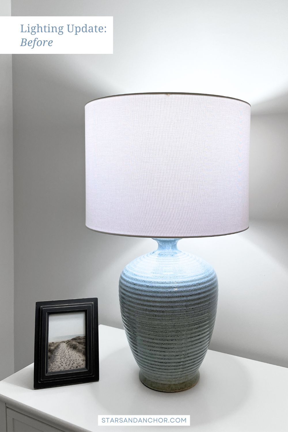 A table lamp demonstrating the light from a cool white light bulb. Text on the image says, Lighting Update: Before.