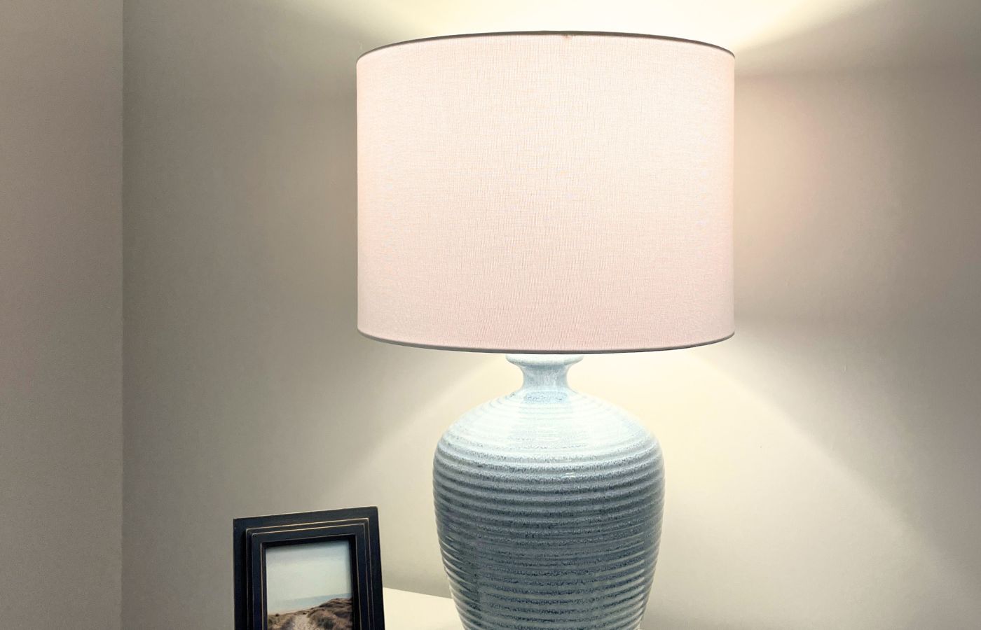 A table lamp demonstrating the light from warm light bulbs.