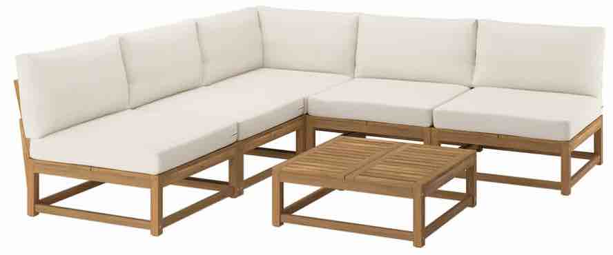 An outdoor conversation set with four seats and a table.