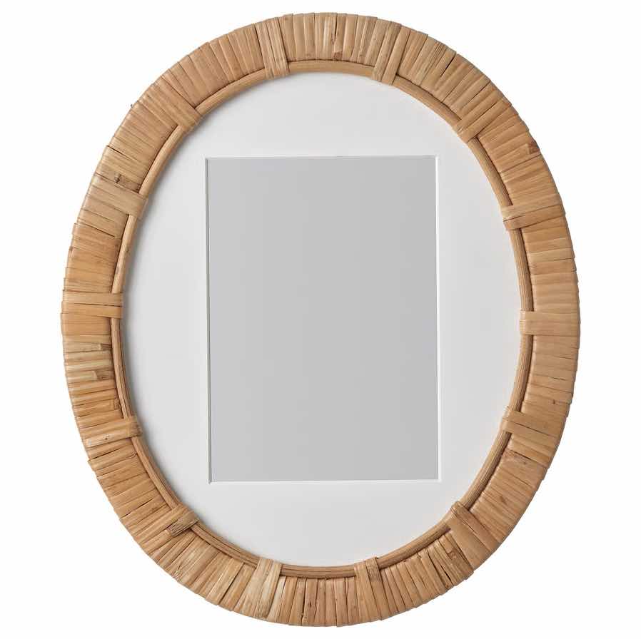 An oval rattan picture frame.
