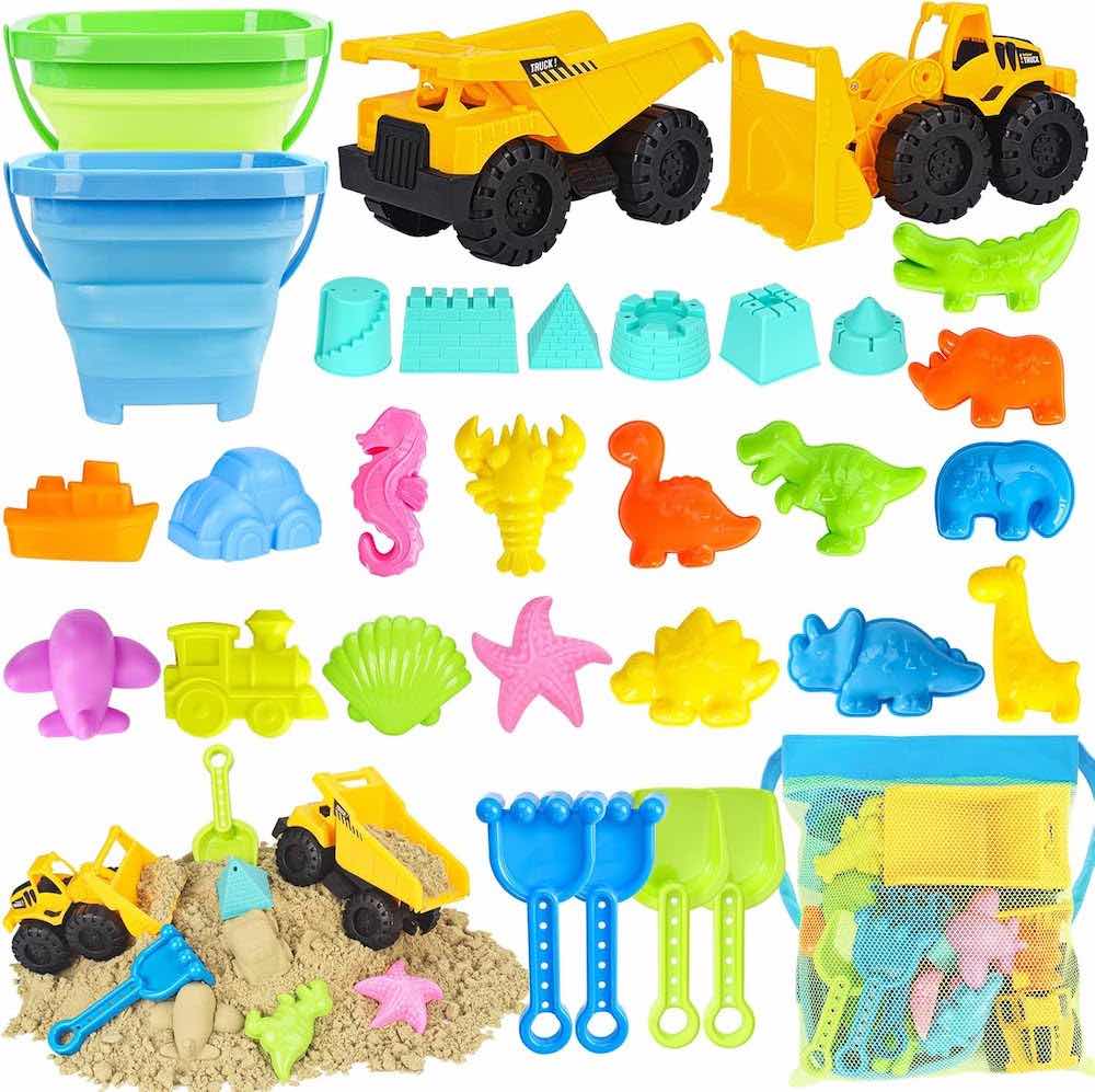 A set of beach toys for toddlers, which includes buckets, a dump truck, a mesh bag, shovels, dinosaur molds, sea animal molds, and sand castle molds.