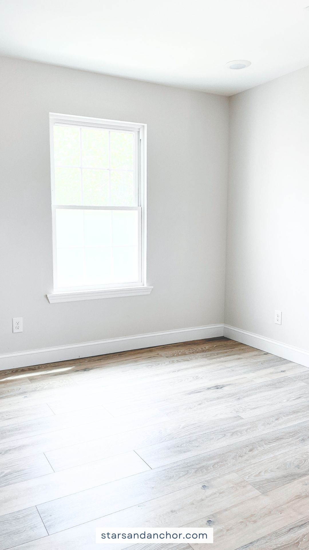 An empty room with a window.