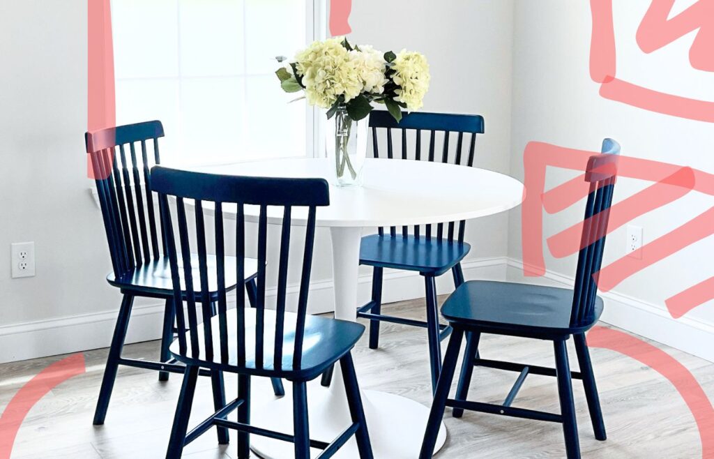 A kitchen dining area with design plans drawn over it.