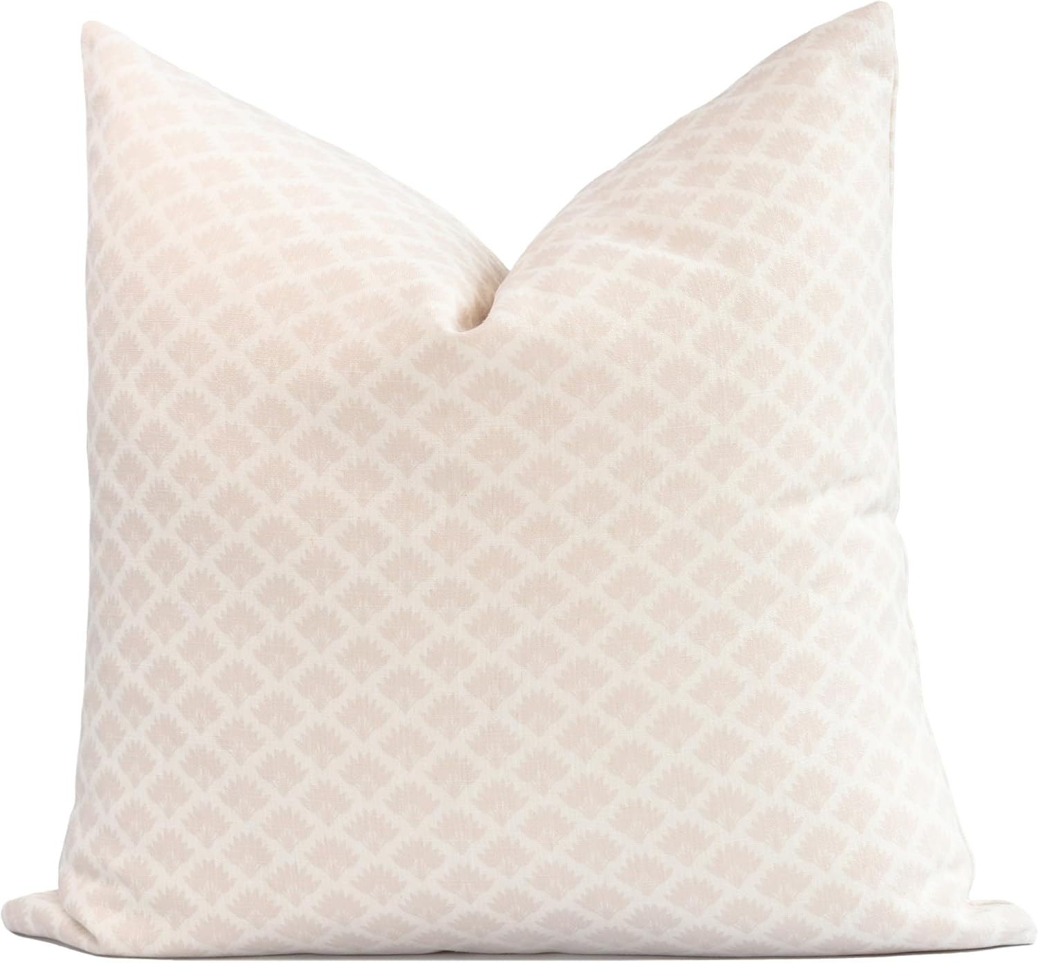 A neutral throw pillow with a subtle palm print.